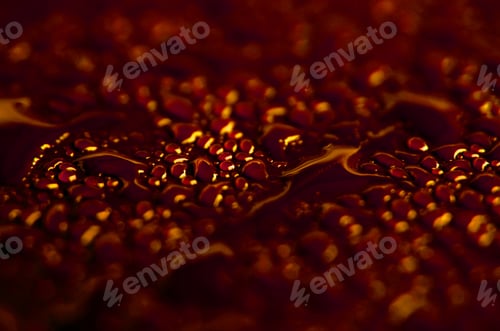 Preview: Closeup of shiny red drops on surface