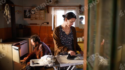 Preview: Portrait of poor mature couple indoors at home, poverty concept