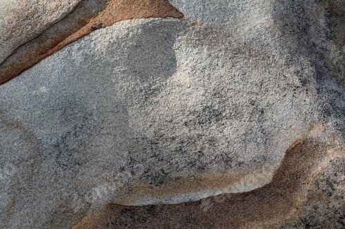 Preview: Textured Surface Of Large Rock - Close Up Photograph Of The Details Of A Large Rock.