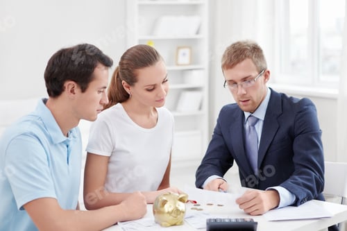 Preview: Financial Advisor Meeting with Couple in an Office