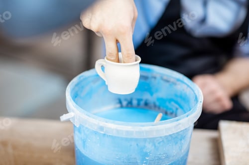 Preview: Painting clay jugs at the pottery