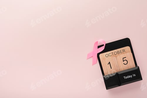 Preview: Pink Breast Cancer Awareness Ribbon. Wooden calendar with pink ribbons on backgrounds.