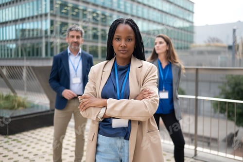 Preview: Several members of the business team with their leader at the front, confident in themselves