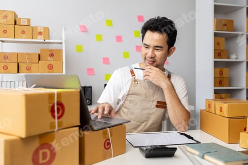 Preview: Online shop owner man, he checks orders on website, online shop owner distributes products on site,
