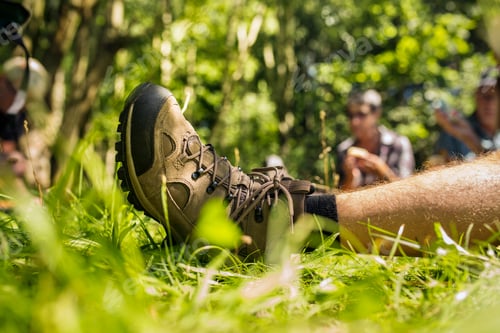 Preview: Man sitting on grass