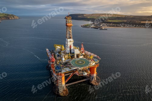 Preview: Oil Drilling Rig at Sunset Aerial View