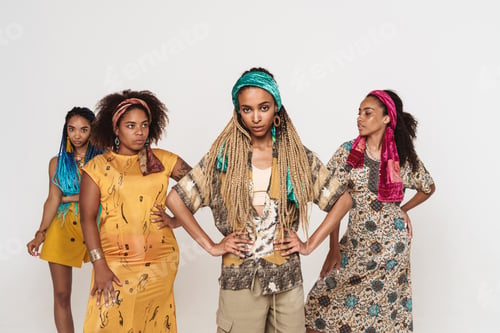 Preview: Young black four women wearing dress posing together on camera