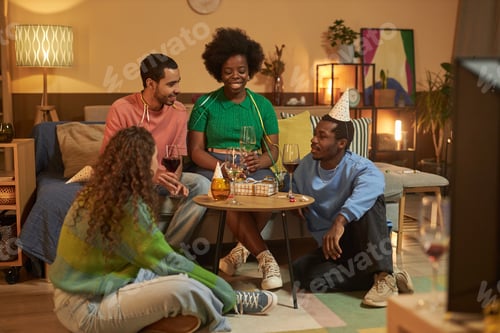 Preview: Group of Friends Enjoying Cozy Birthday Celebration