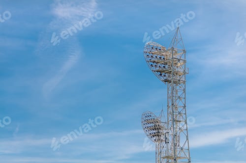 Preview: Stadium light against blue sky. Sports architecture and equipment