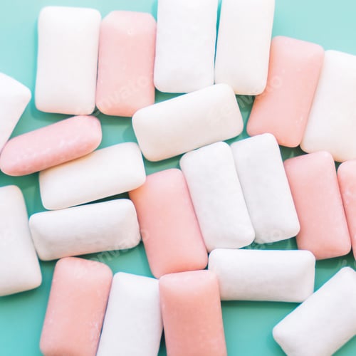 Preview: White and pink gum pads on a green background