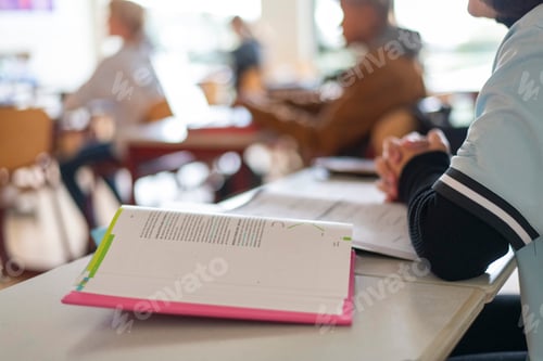 Preview: close up of students books