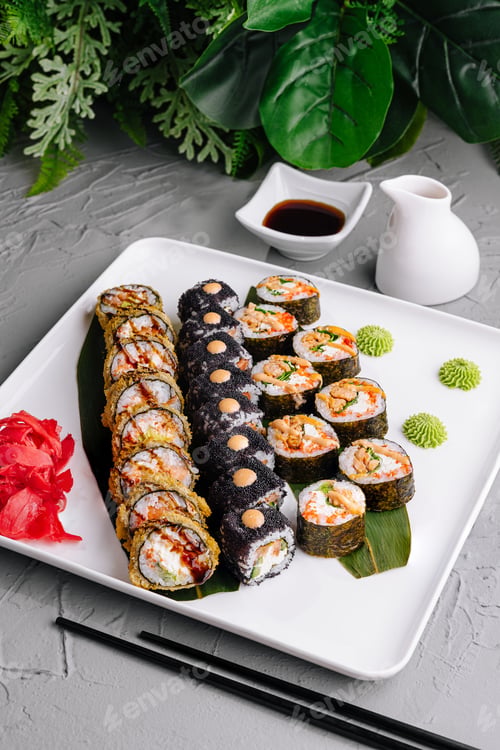 Preview: Assorted sushi rolls platter with dipping sauce