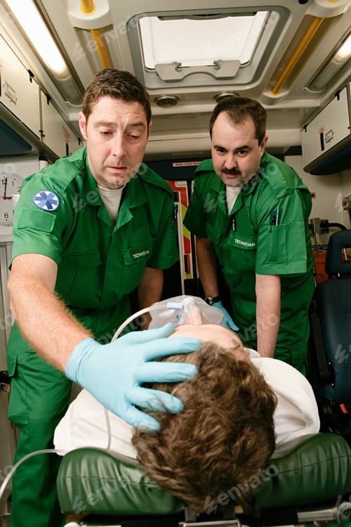 Preview: Ambulance technicians caring for patient