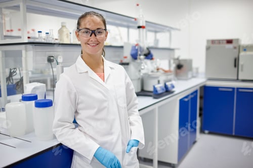 Preview: Scientist smiling in laboratory
