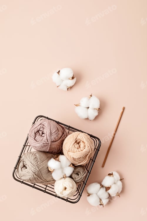Preview: Craft hobby background with yarn in natural colors