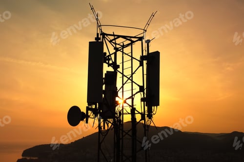 Preview: Amazing closeup sunset drone view of silhouette of cell tower