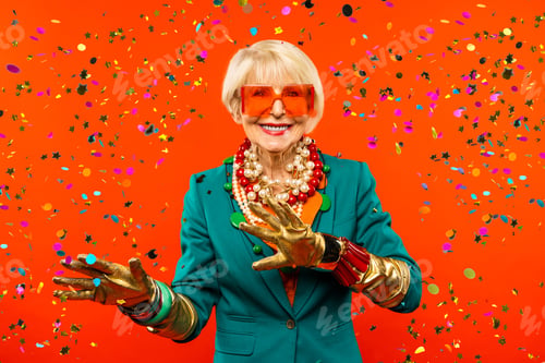 Preview: Cool and stylish senior old woman with fashionable clothes