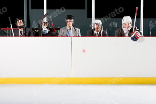 Preview: Businessmen playing ice hockey
