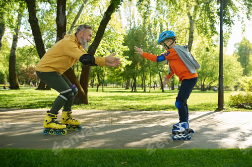 Preview: Grandfather teaching grandson riding roller skates in city park