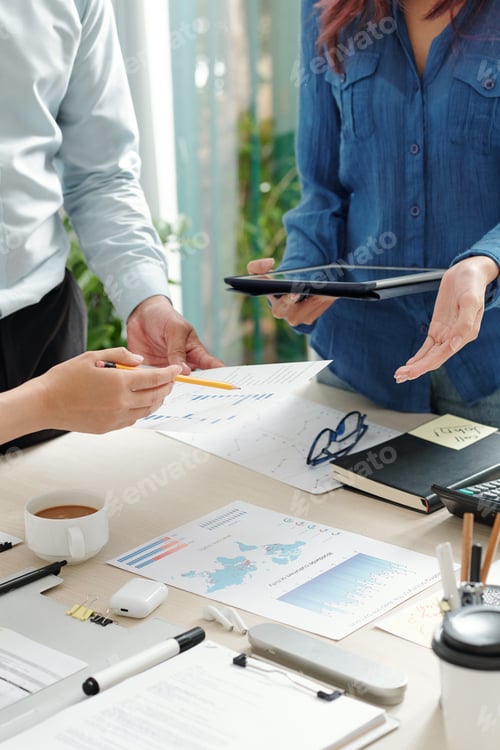 Preview: Business people working with papers