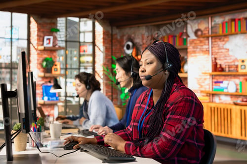 Preview: Multiethnic team of call center agents answering clients technical inquiries