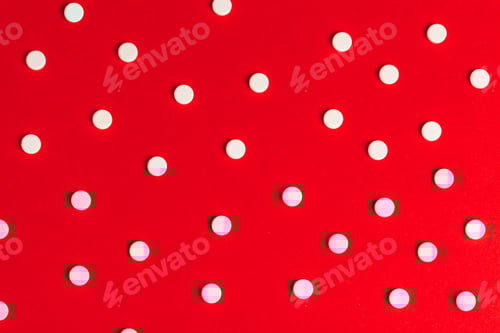 Preview: Top view of pharmaceutical medicine pills on red background