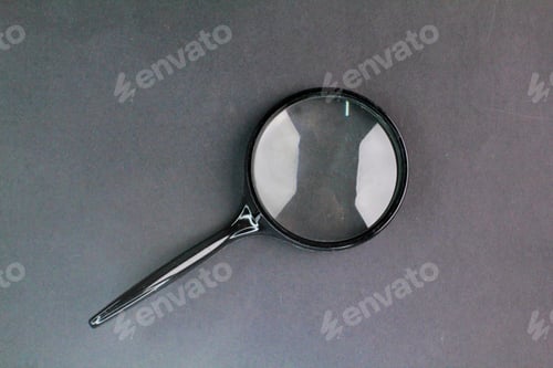 Preview: magnifying glass magnifier loupe search symbol on black gray background with copy space. Searching c