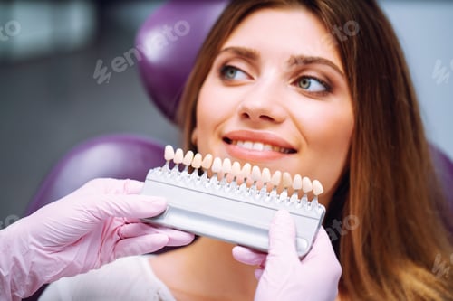Preview: Beautiful woman smile with healthy teeth whitening. Matching shades of the implants. Healthy Smile.