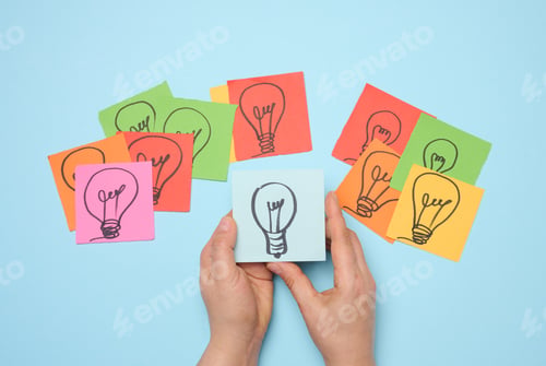 Preview: Drawn electric lamps on stickers, concept of searching for new ideas, brainstorming