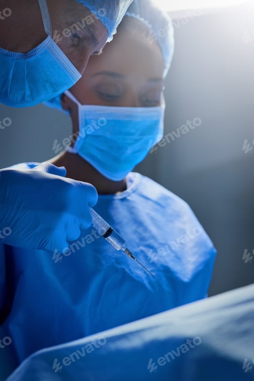 Preview: Surgeons Preparing Injection in Hospital Operating Room