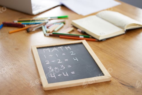 Preview: Chalkboard, math or notebook in homeschool study at house in covid lockdown, quarantine or social d