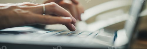Preview: Female hands typing on laptop computer keyboard