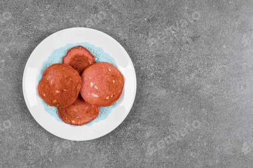 Preview: Delicious grilled salami on white plate