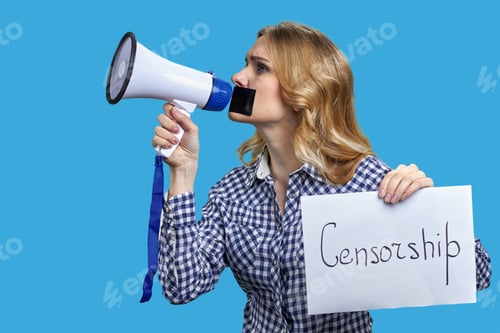 Preview: Young blonde woman holding megaphone and banner with censorship inscription.