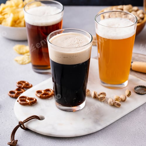 Preview: Variety of beer with snacks on the table