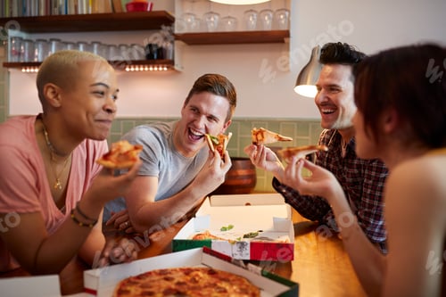 Preview: Group Of Gay Friends Meeting At Home And Eating Takeaway Pizza