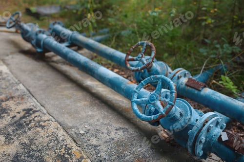 Preview: Rusted valves and pipes.