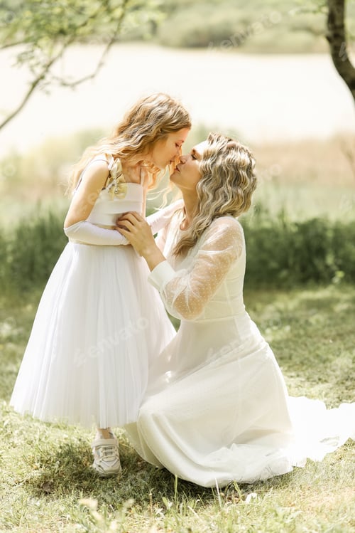 Preview: Mom and daughter in white dresses