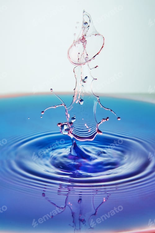 Preview: Abstract background of splash of color water, collision of colored drops, the concept