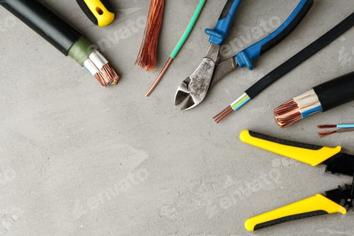 Preview: Electrical Tools and Wires on Gray Surface