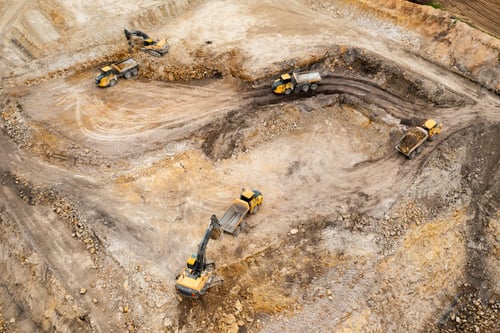 Preview: Aerial view of excavators digging ground. Opencast mining quarry