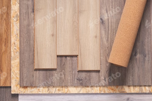 Preview: Laminate floor and cork roll on wood osb background texture. Wooden laminate floor and chipboard