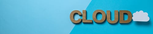 Preview: The word "Coloud" in wooden letters on a blue background, place for text