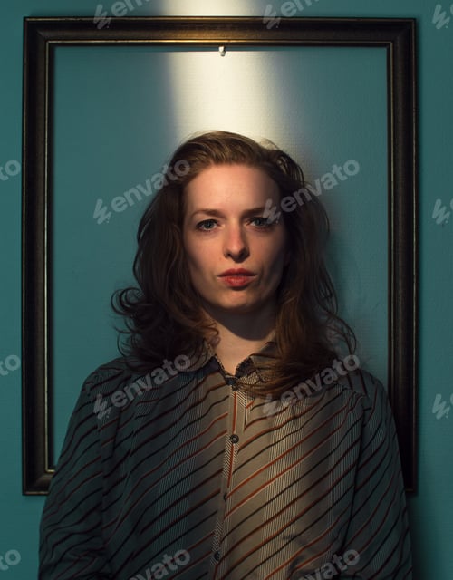 Preview: expressive caucasian female portrait,framed in frame