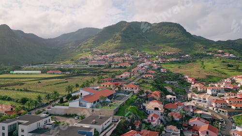 Preview: Drone picturesque village rooftops at mediterranean countryside. Shore town