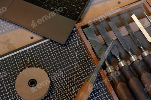 Preview: Leathercrafting Tools and Laptop on Workbench