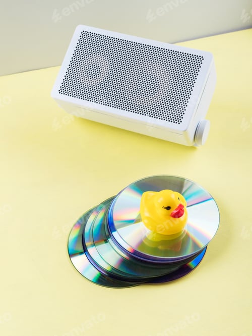 Preview: Retro gray music speakers with cd on yellow