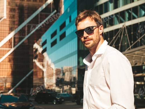 Preview: Handsome man posing outdoors