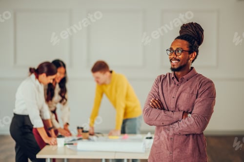 Preview: Portrait of an arabic man architect posing in the office during a meeting