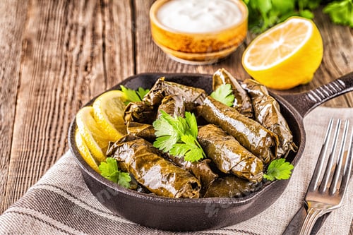 Preview: Dolma, stuffed grape leaves with rice and meat.